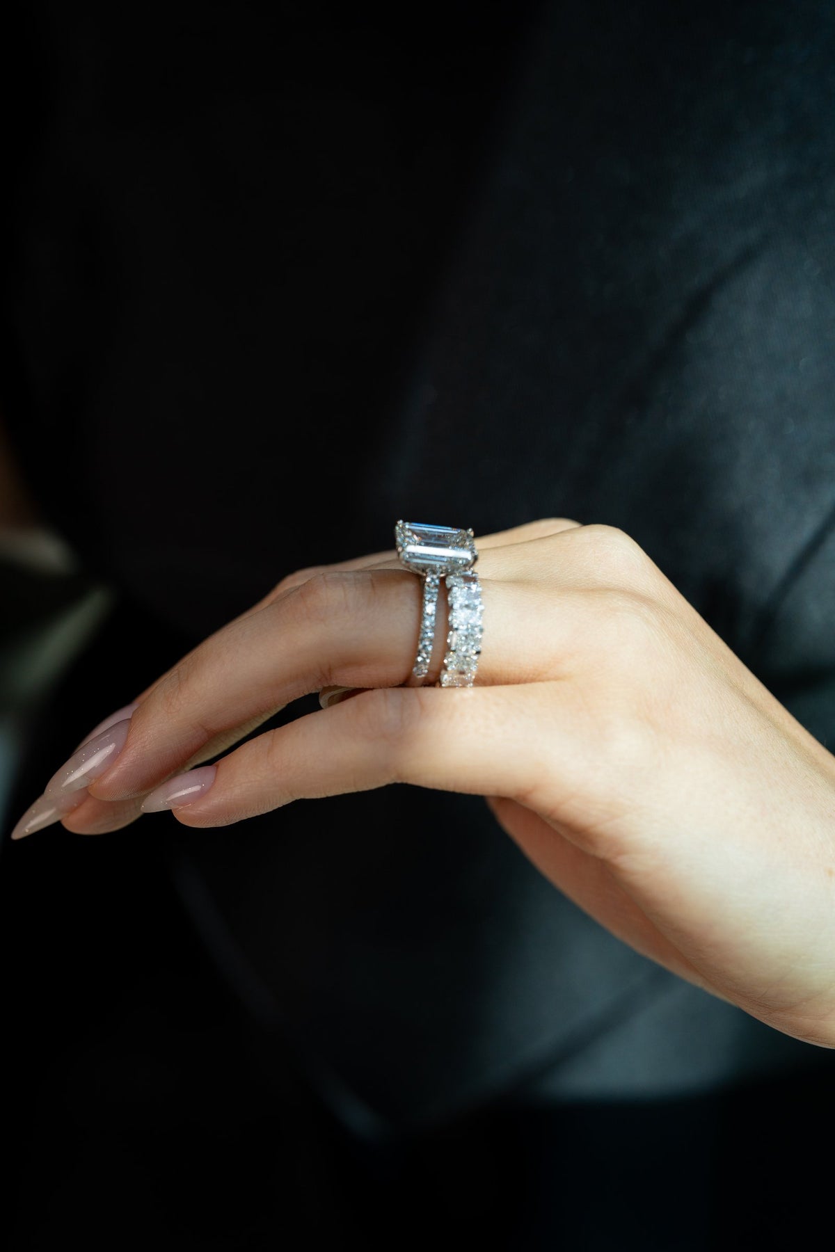 Stellar Gems lab-grown emerald-cut diamond ring on black velvet