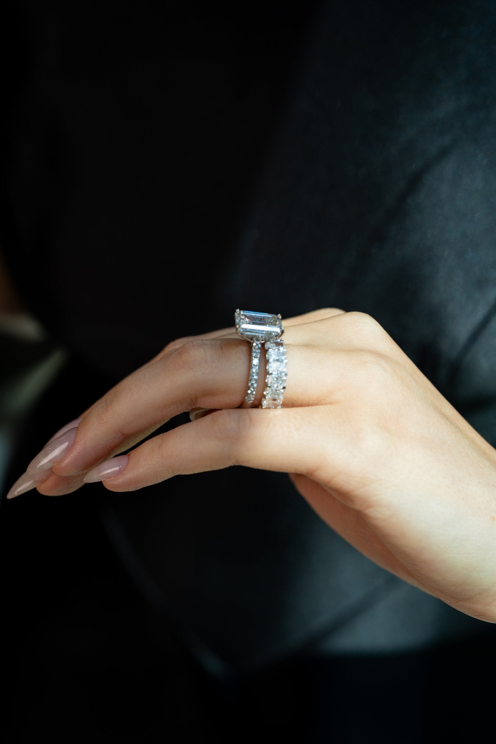 Stellar Gems lab-grown emerald-cut diamond ring on black velvet