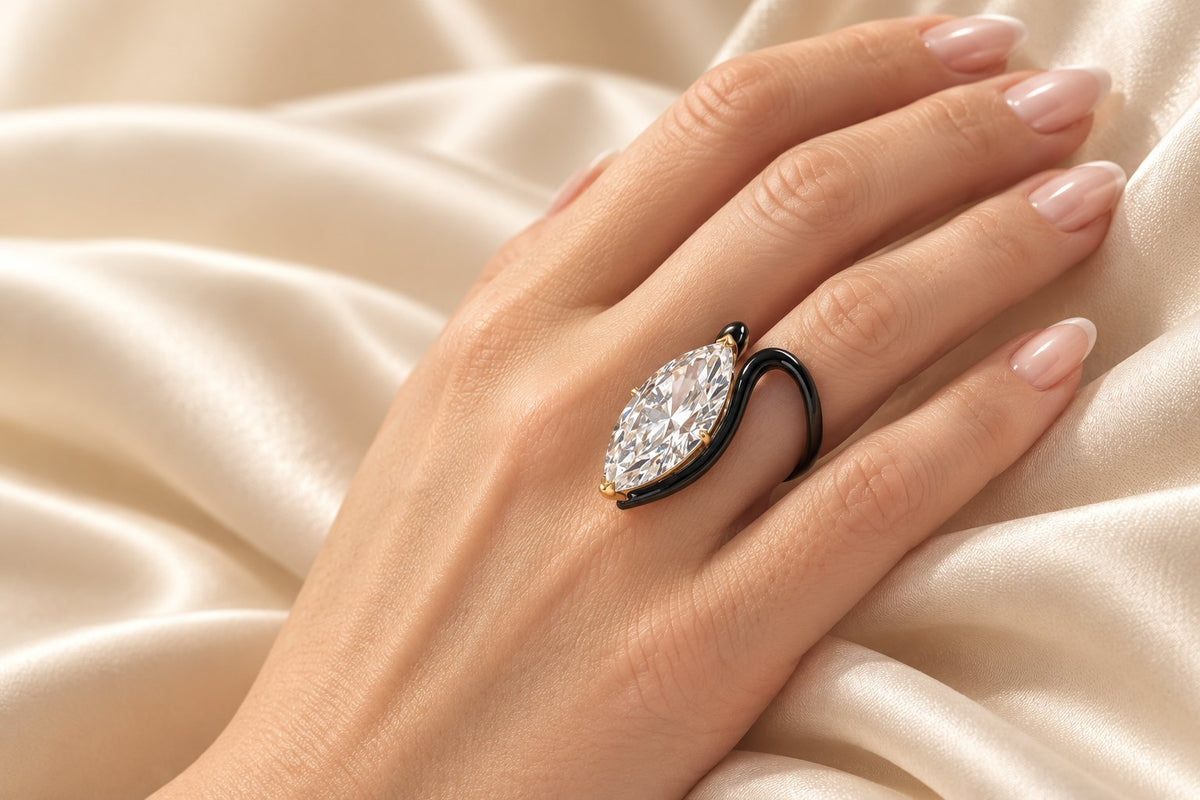 Bespoke east-west marquise diamond ring with black enamel band